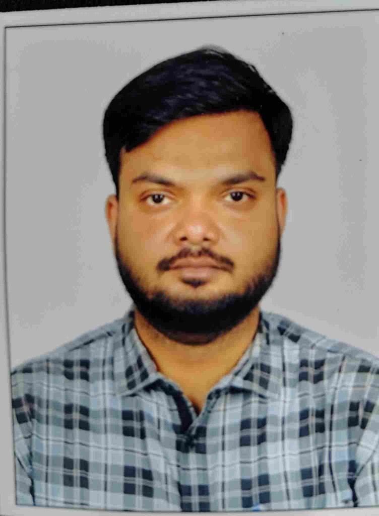 Dr. Magesh K